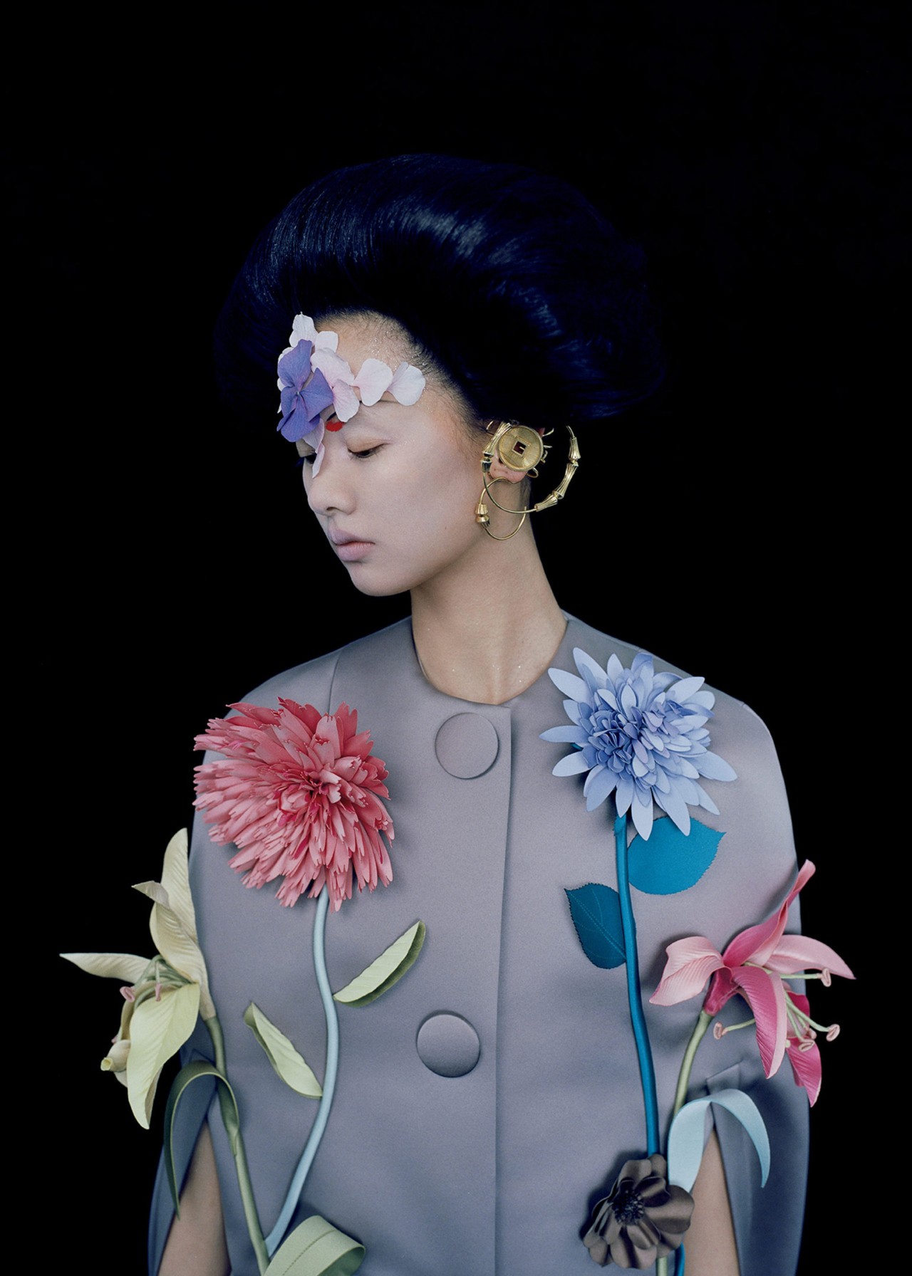 Model wears a Viktor and Rolf Couture cape in Shanghai by Leslie Zhang