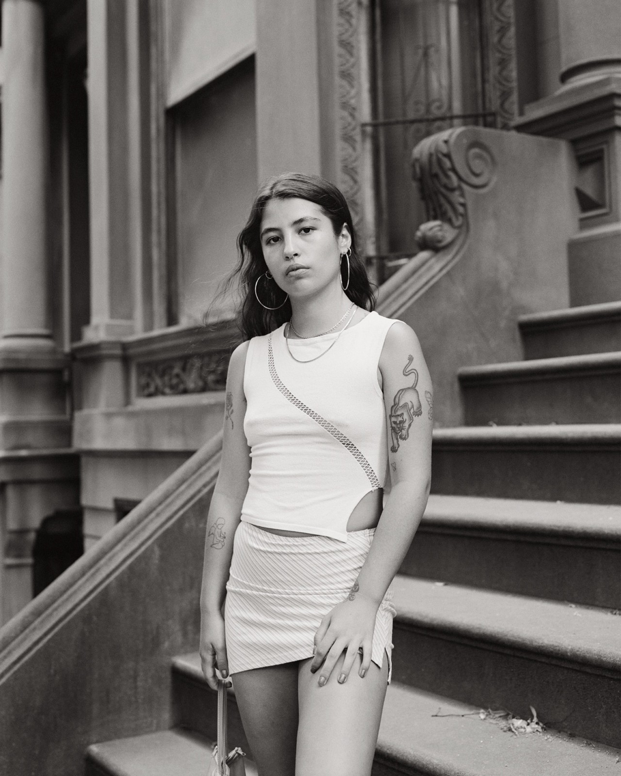 Portrait of woman in New York City by Ben Grieme