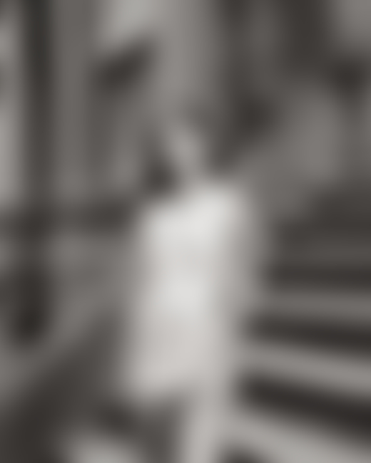 Portrait of woman in New York City by Ben Grieme