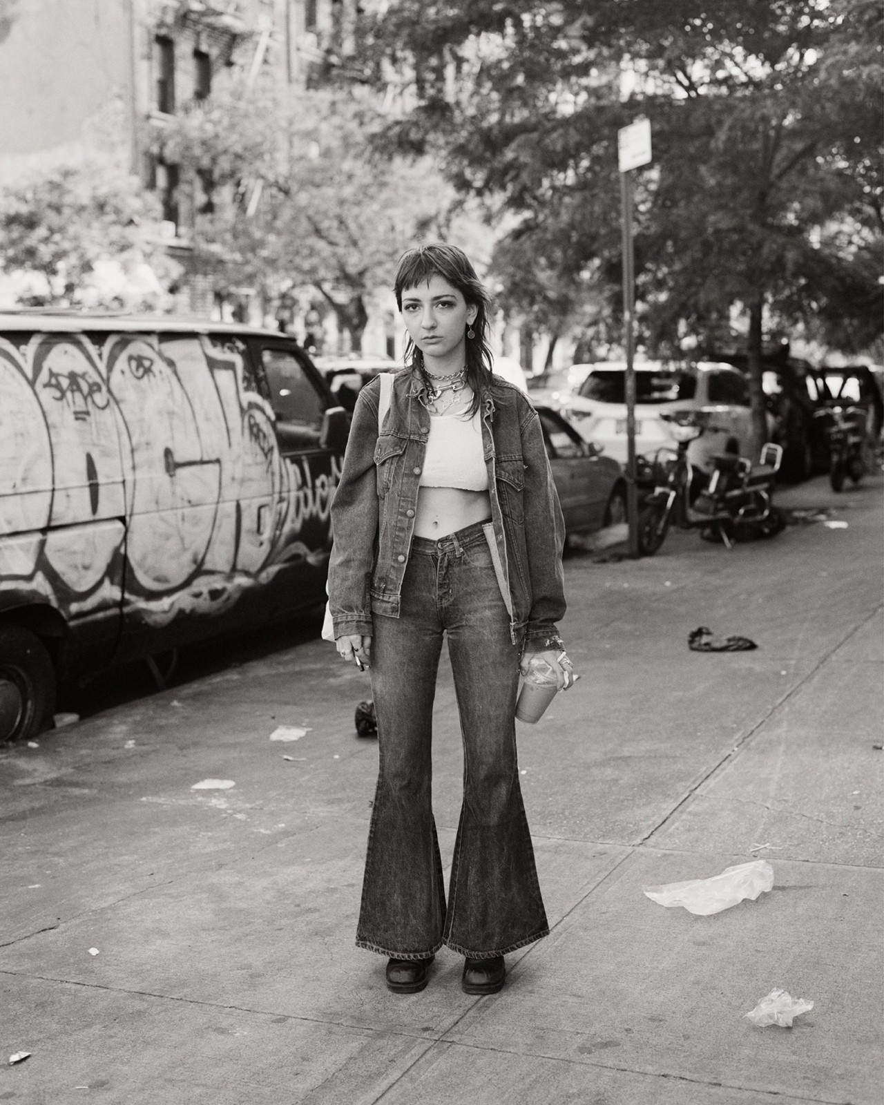 Portrait of woman on street in New York City by Ben Grieme