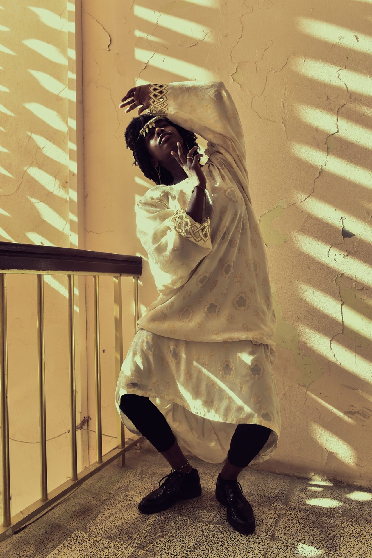 Model wearing local fashion in Oman by Ali Al Sharji
