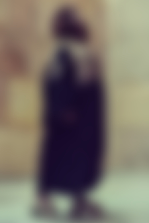 A model wears an abaya in Oman by Ali Al Sharji