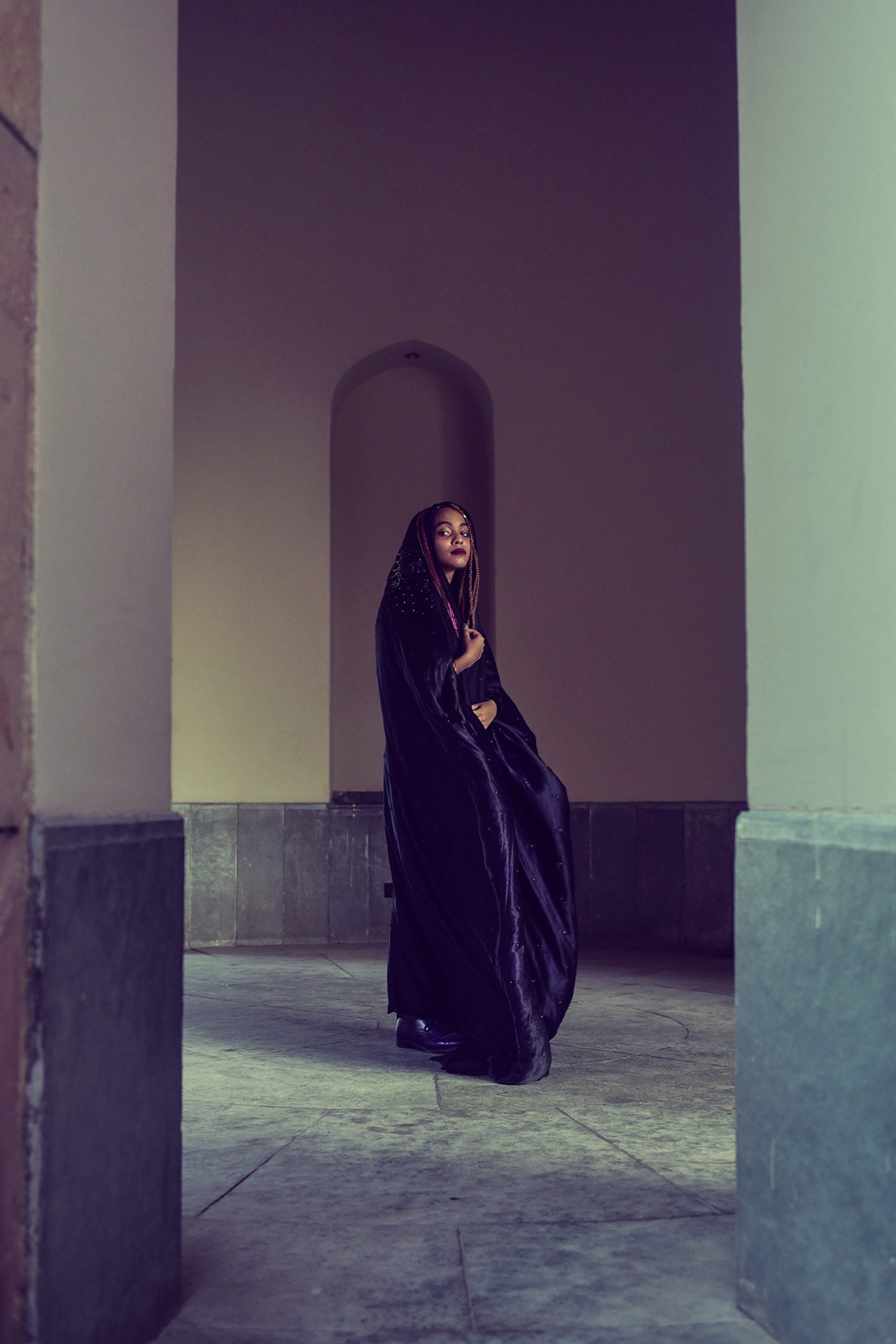 A model wears an abaya in Oman by Ali Al Sharji