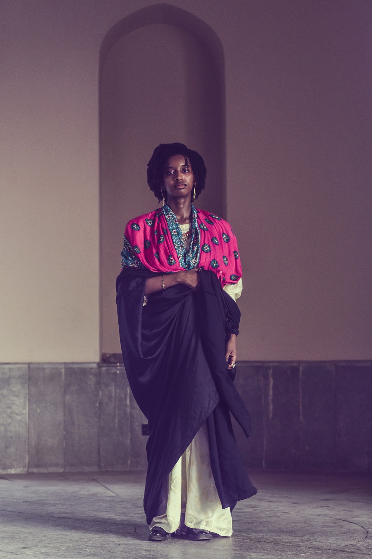 A model wears local fashion in Oman by Ali Al Sharji