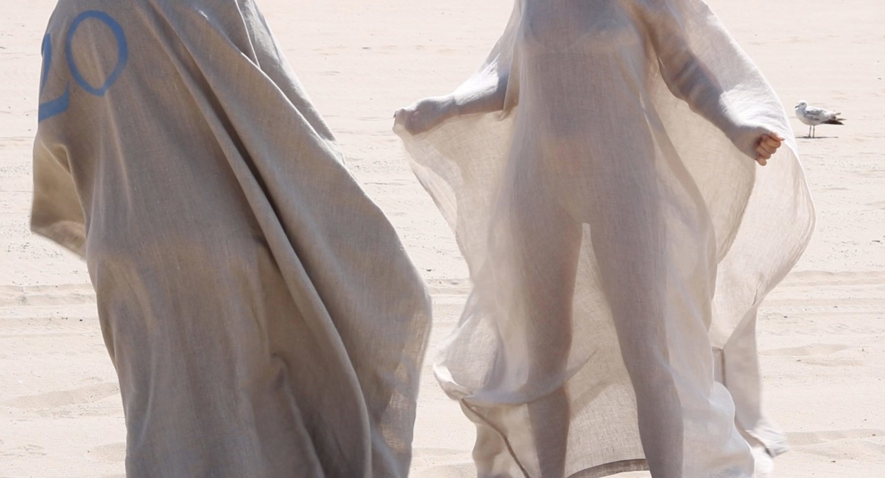 Artwork depicting two people in sheer coverings called SUN+ by buro BELéN