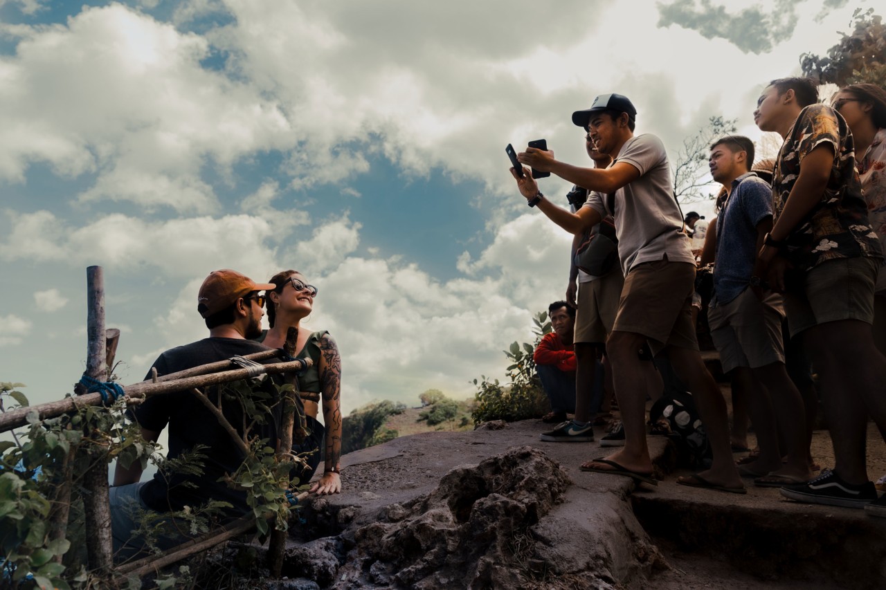 Tourists taking pictures in Nusa Penuda Indonesia by Rishabh Malik