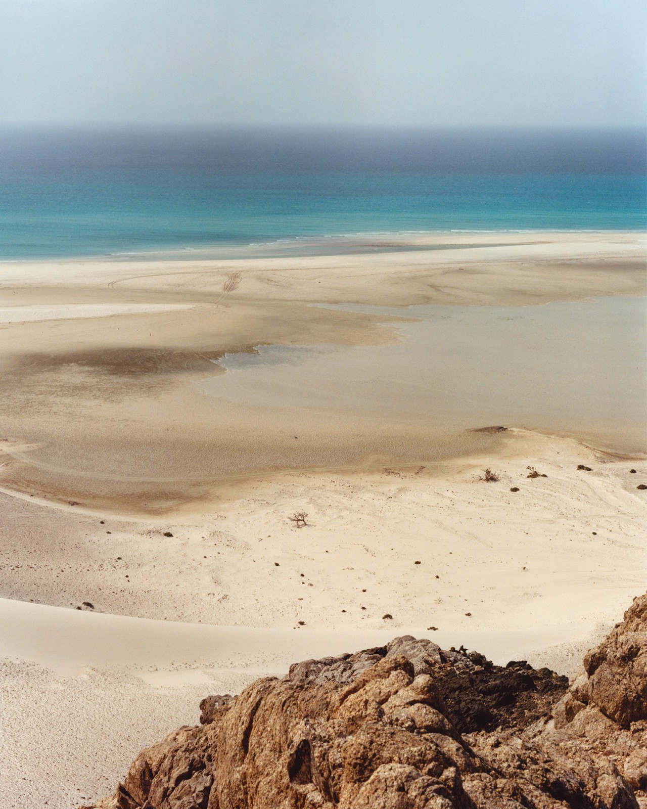 Sand dune and ocean in Socotra Yemen by Jamie Hawkesworth