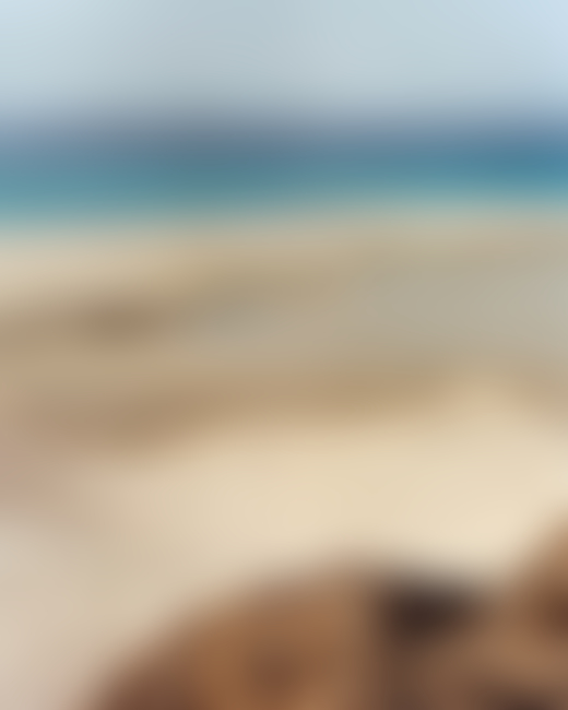 Sand dune and ocean in Socotra Yemen by Jamie Hawkesworth