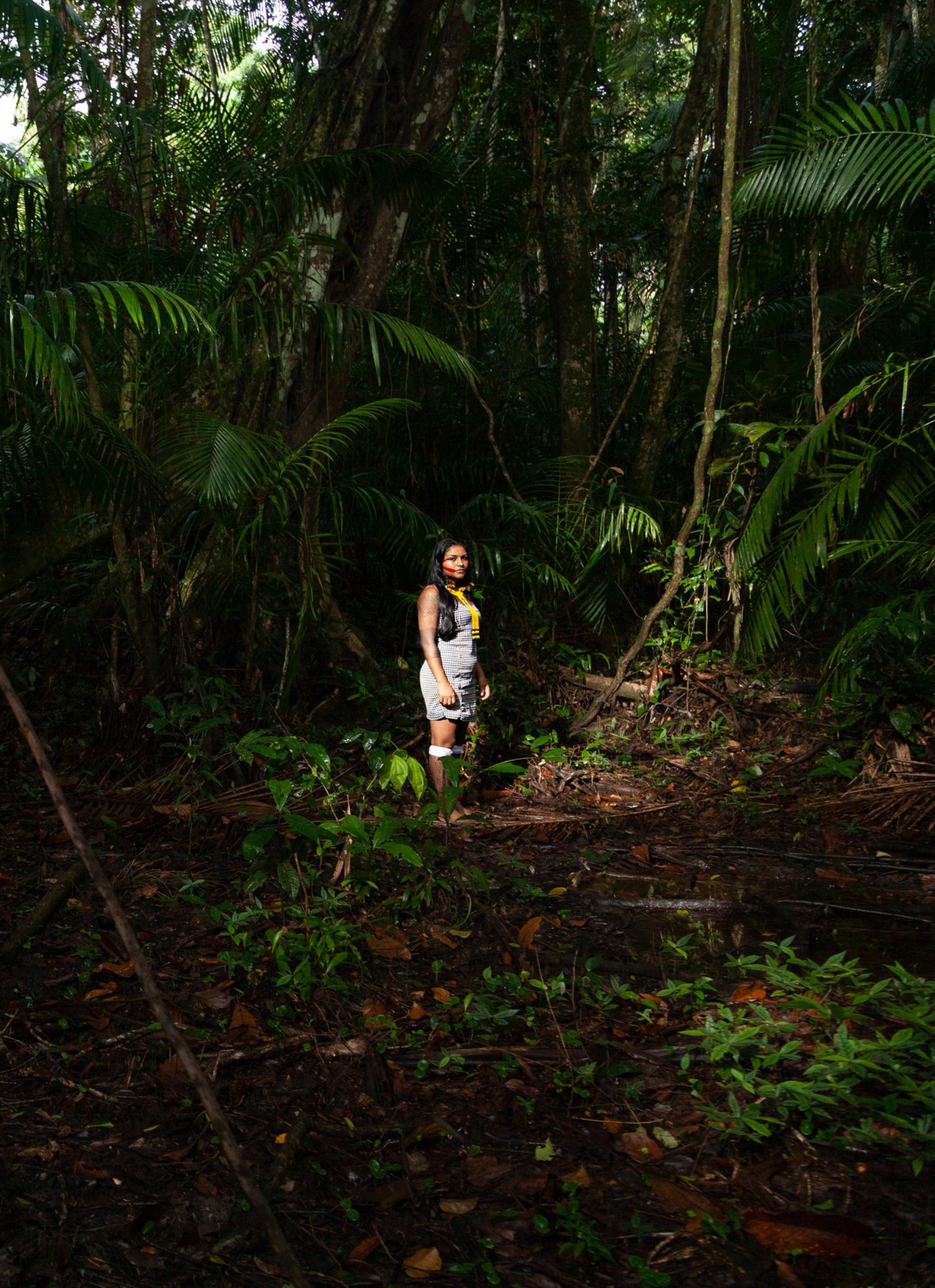 Amazon activist Juma Xipaya in the forest by Liliana Merizalde