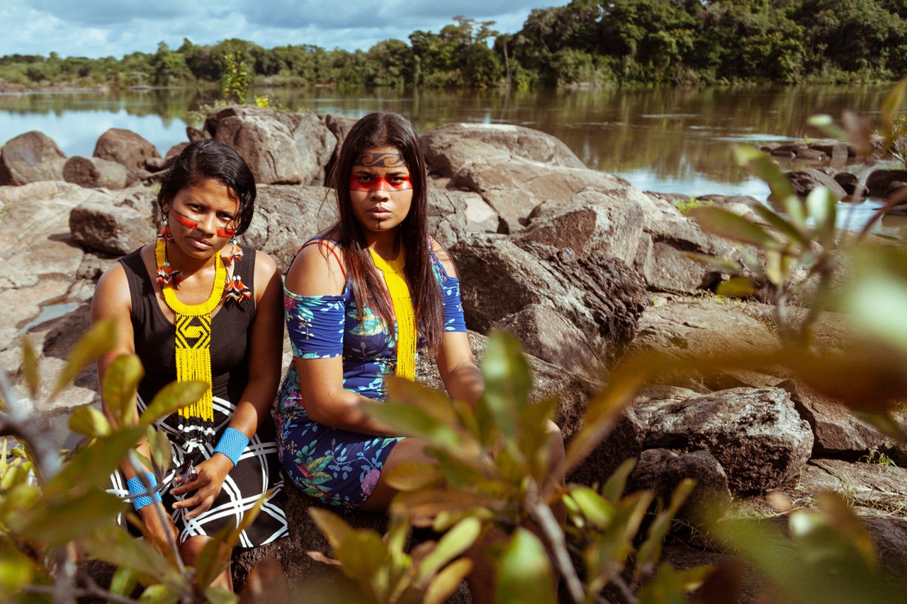 Amazon activists on the river portrait by Liliana Merizalde