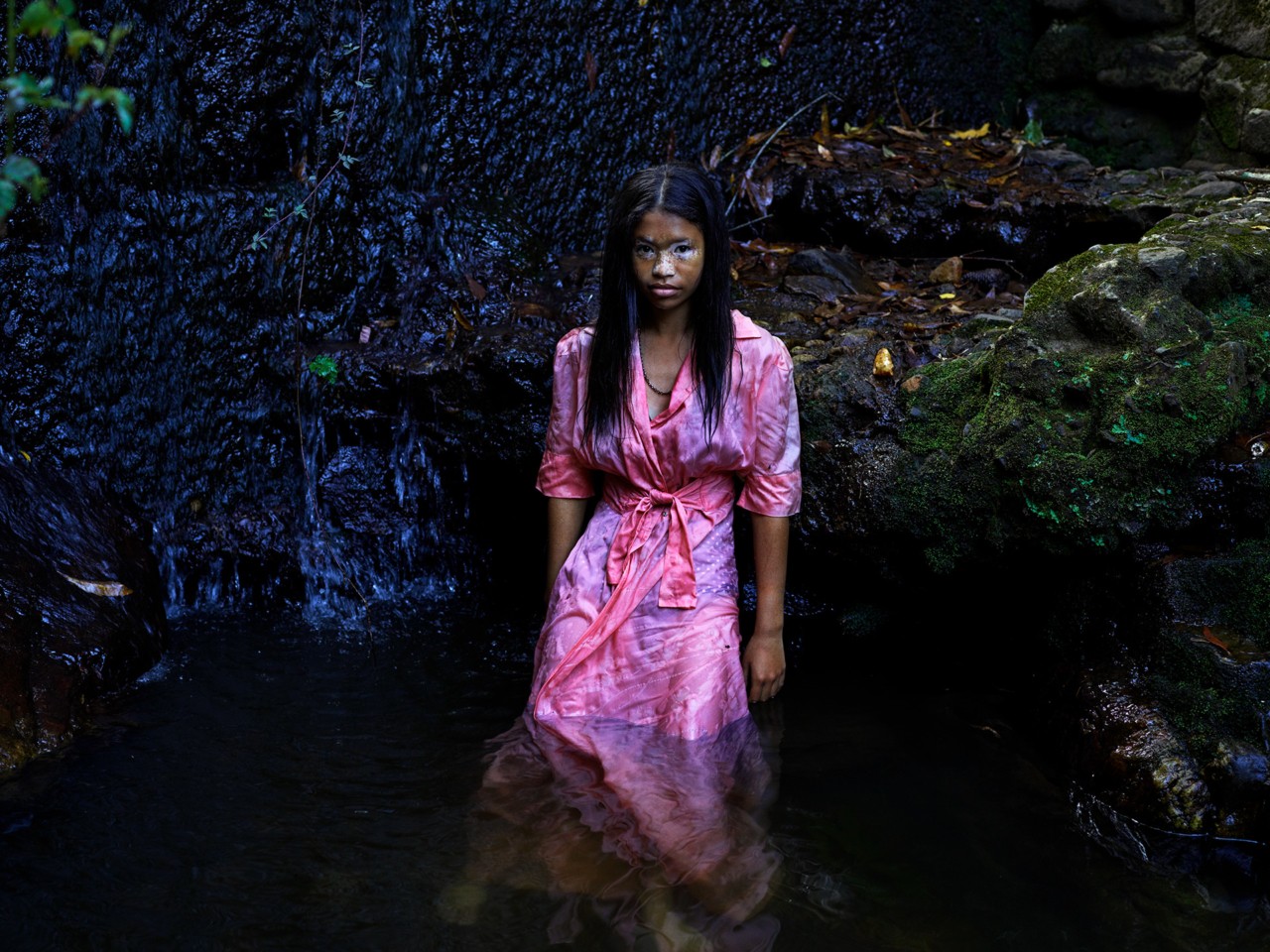 Child in pink dress in forest by Pieter Hugo