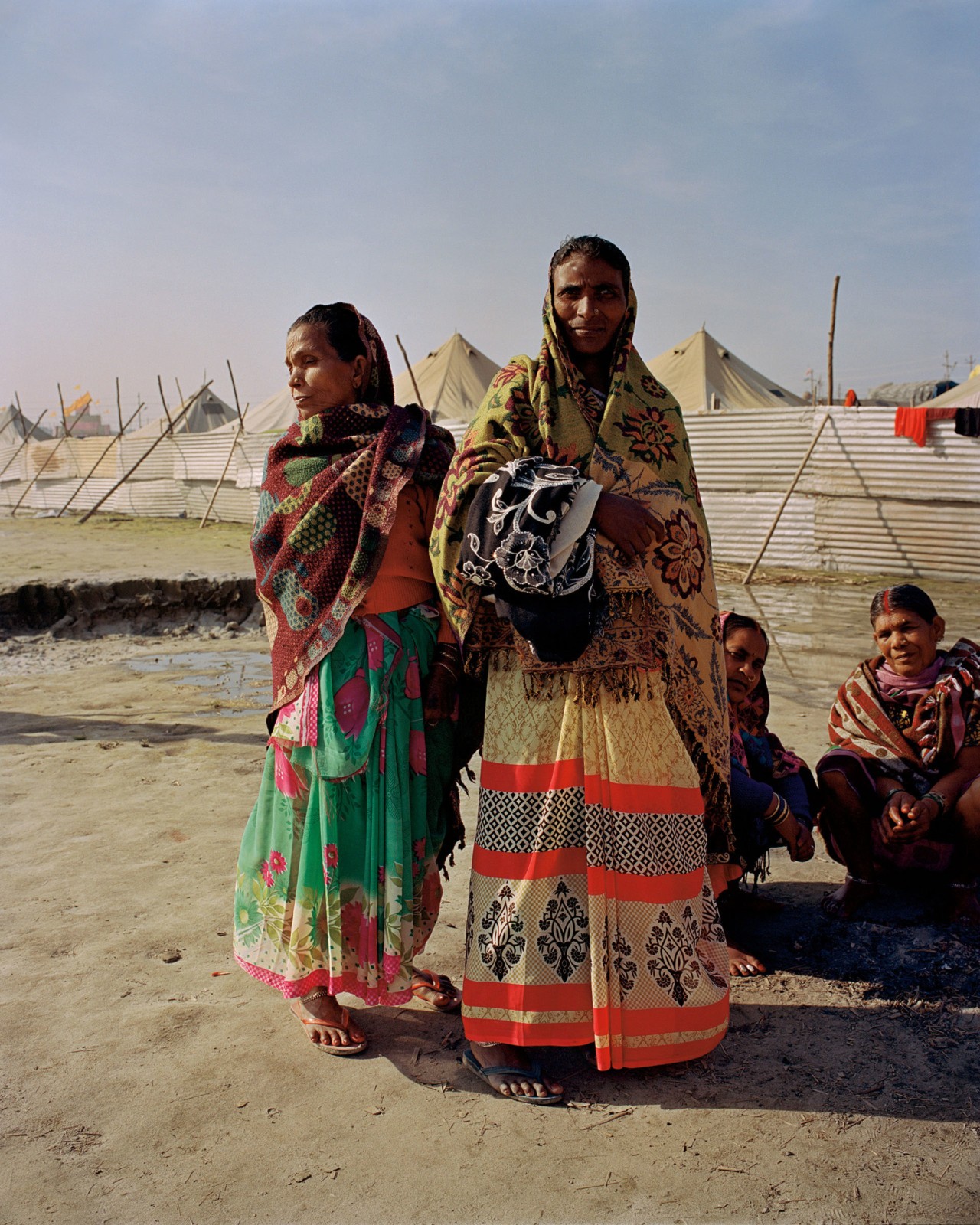 People along the Ganges River in India by Ashish Shah