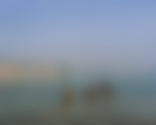 People bathing along the Ganges River in India by Ashish Shah