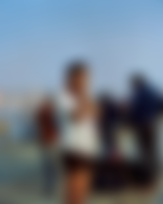 People bathing along the Ganges River in India by Ashish Shah