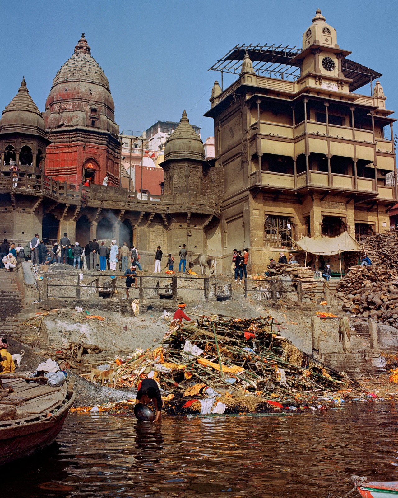 People along the Ganges River in India by Ashish Shah