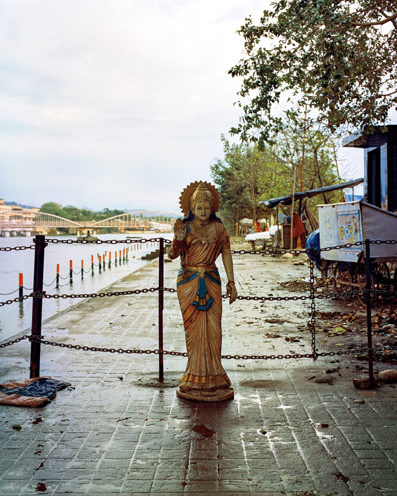Statue on the Ganges River in India by Ashish Shah