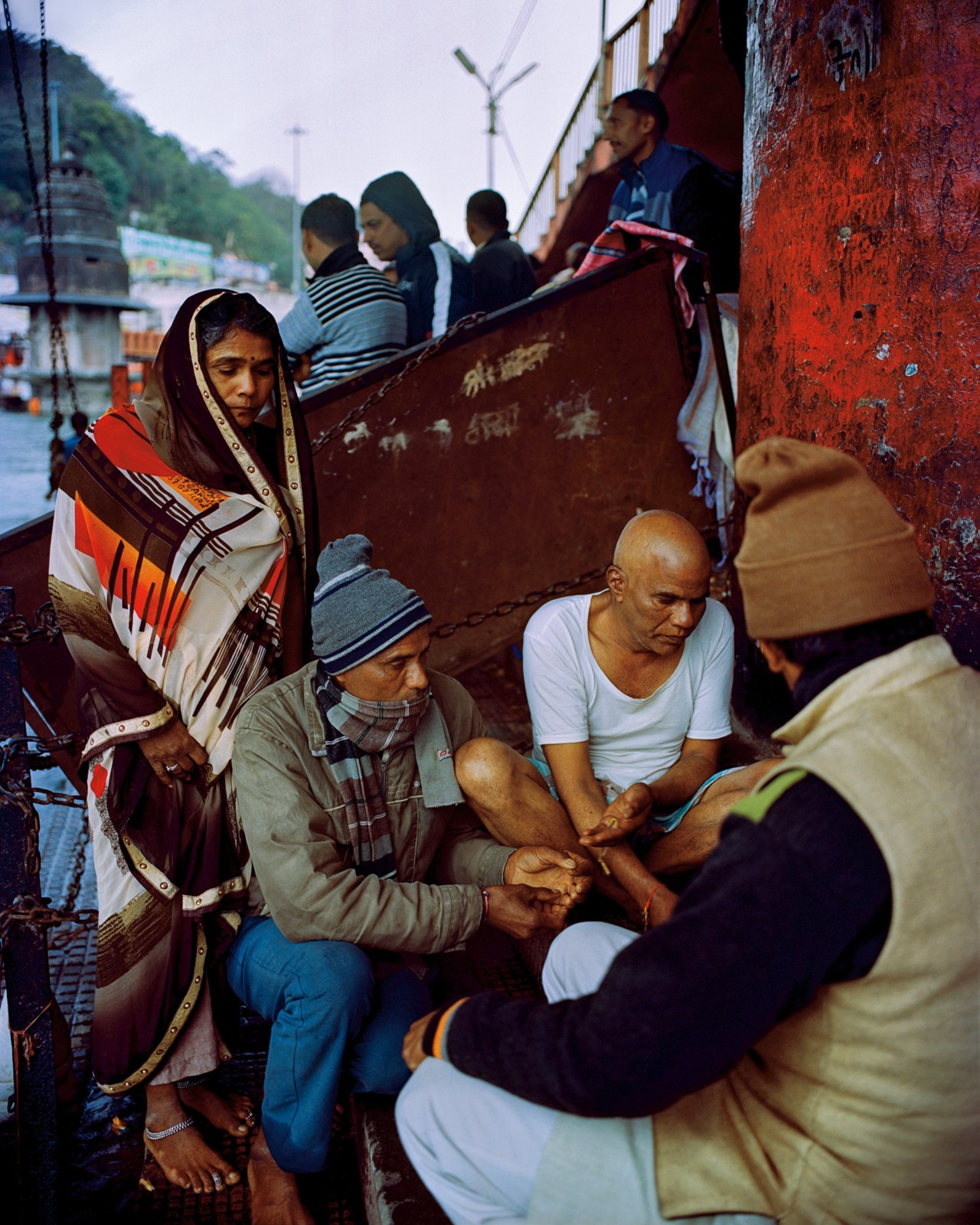 People along the Ganges River in India by Ashish Shah