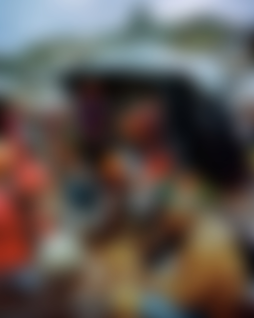 People along the Ganges River in India by Ashish Shah