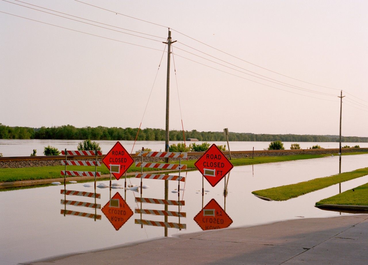 Flooded Iowa street by Ryan Plett