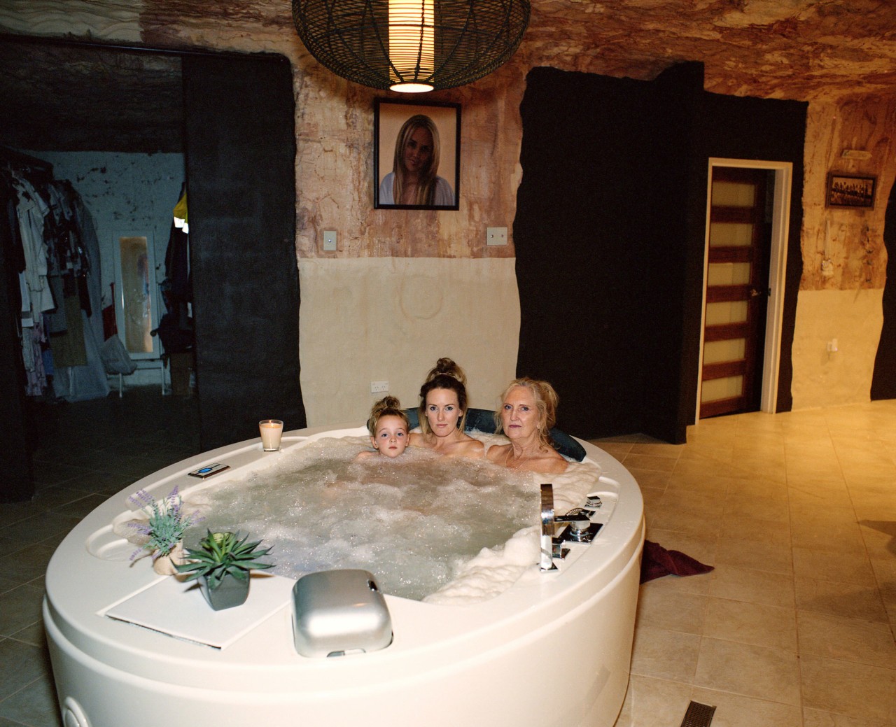 Coober Pedy women in a jacuzzi by Alex Lockett