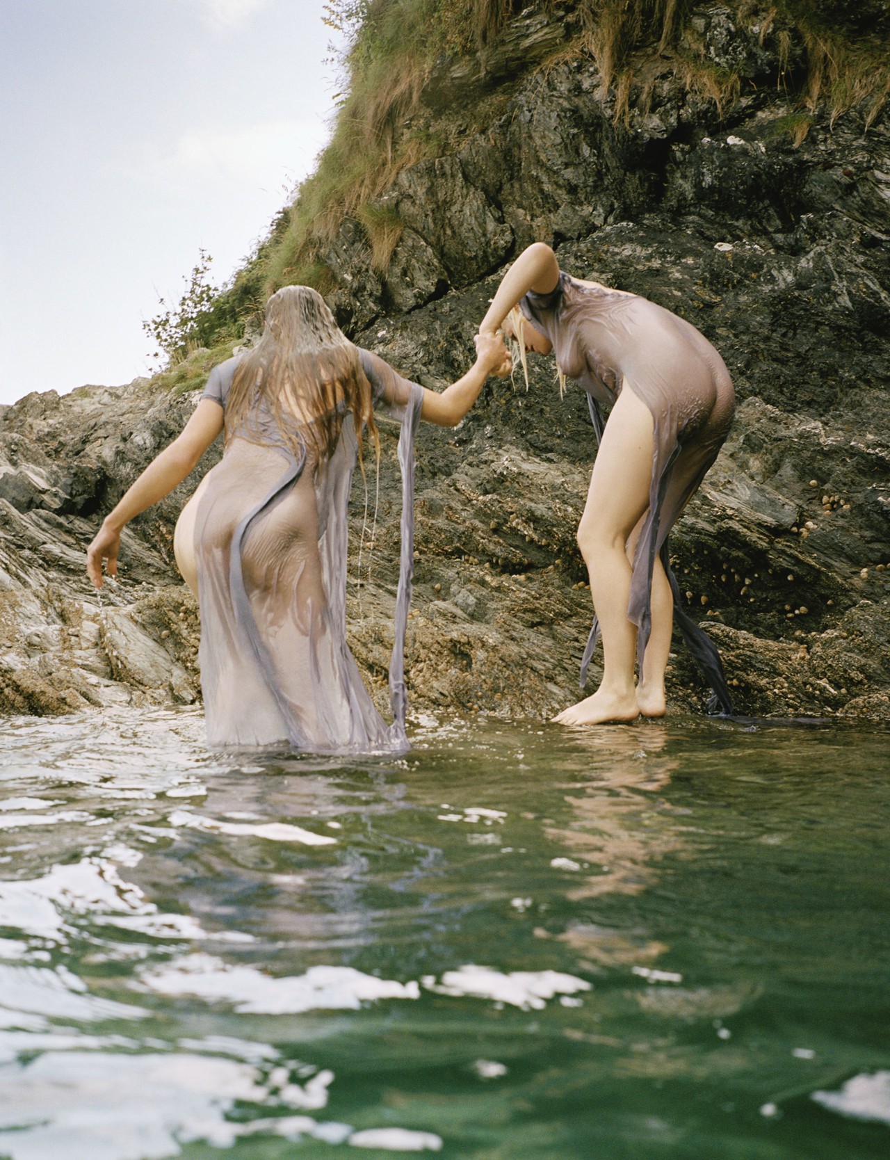 Models swimming in Cornwall by Ben Toms