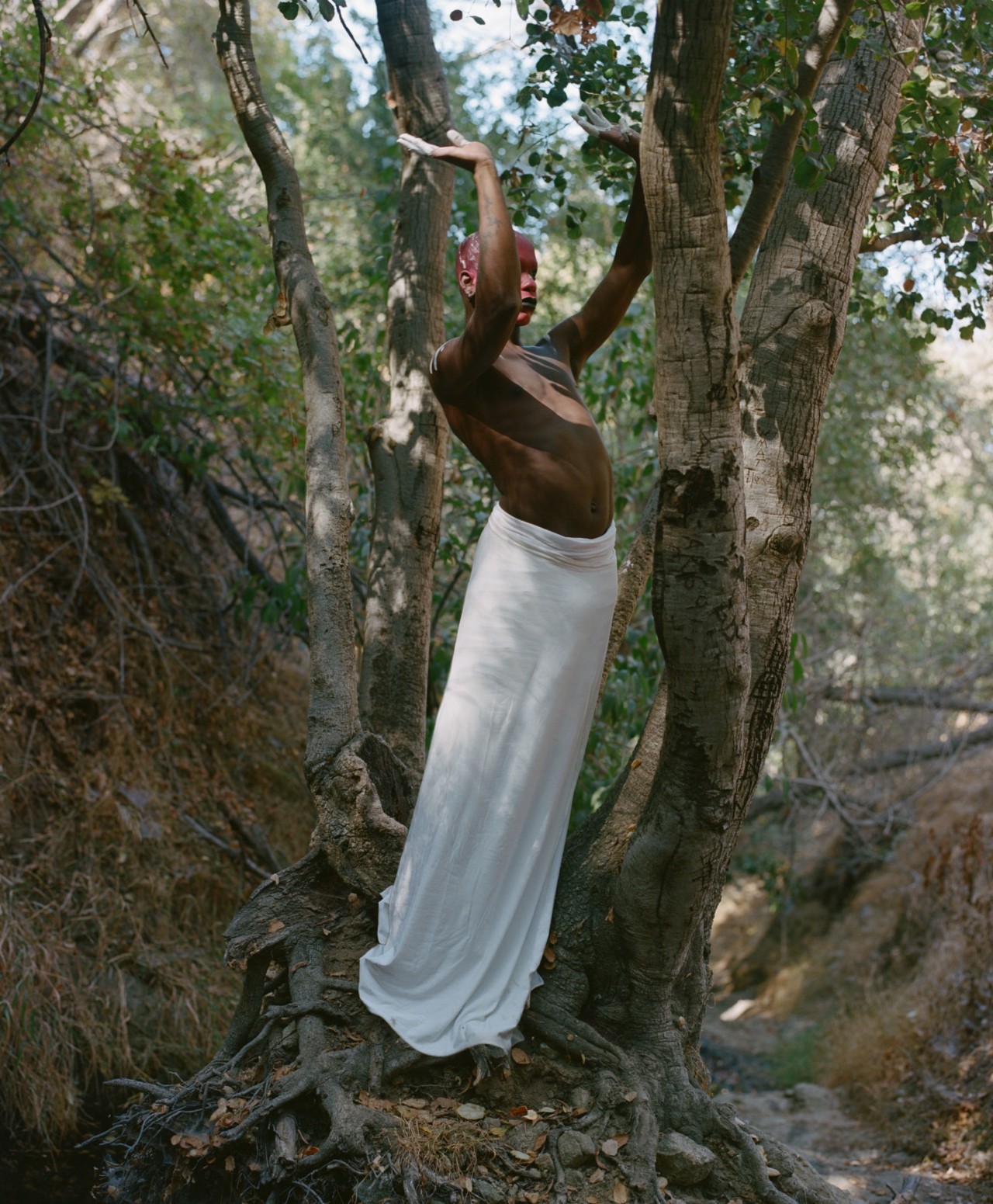 Performance artist DVVSK in nature by Daniel Jack Lyons