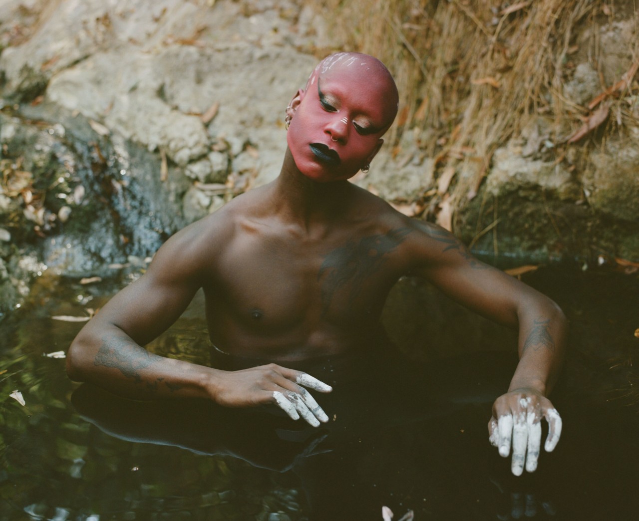 Performance artist DVVSK in nature by Daniel Jack Lyons