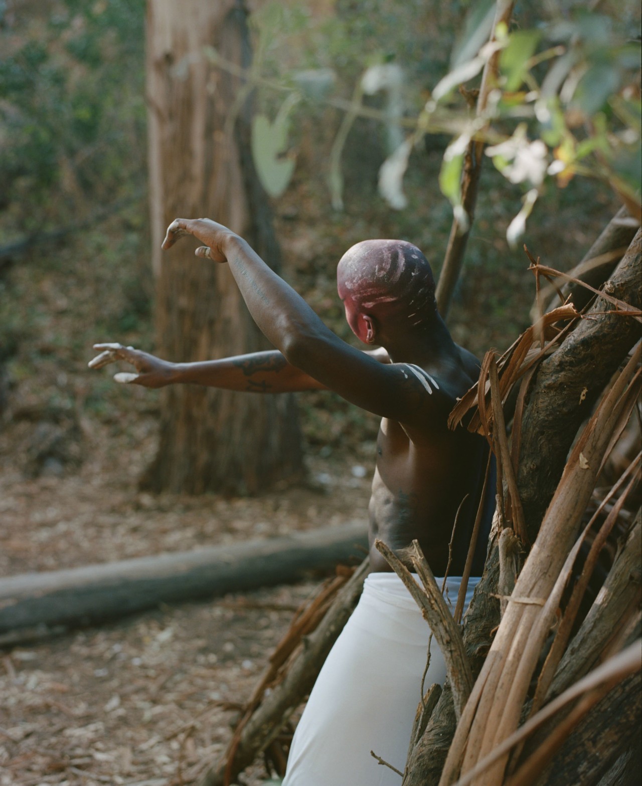 Performance artist DVVSK in nature by Daniel Jack Lyons