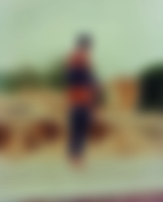 Two people by India water well by Bharat Sikka