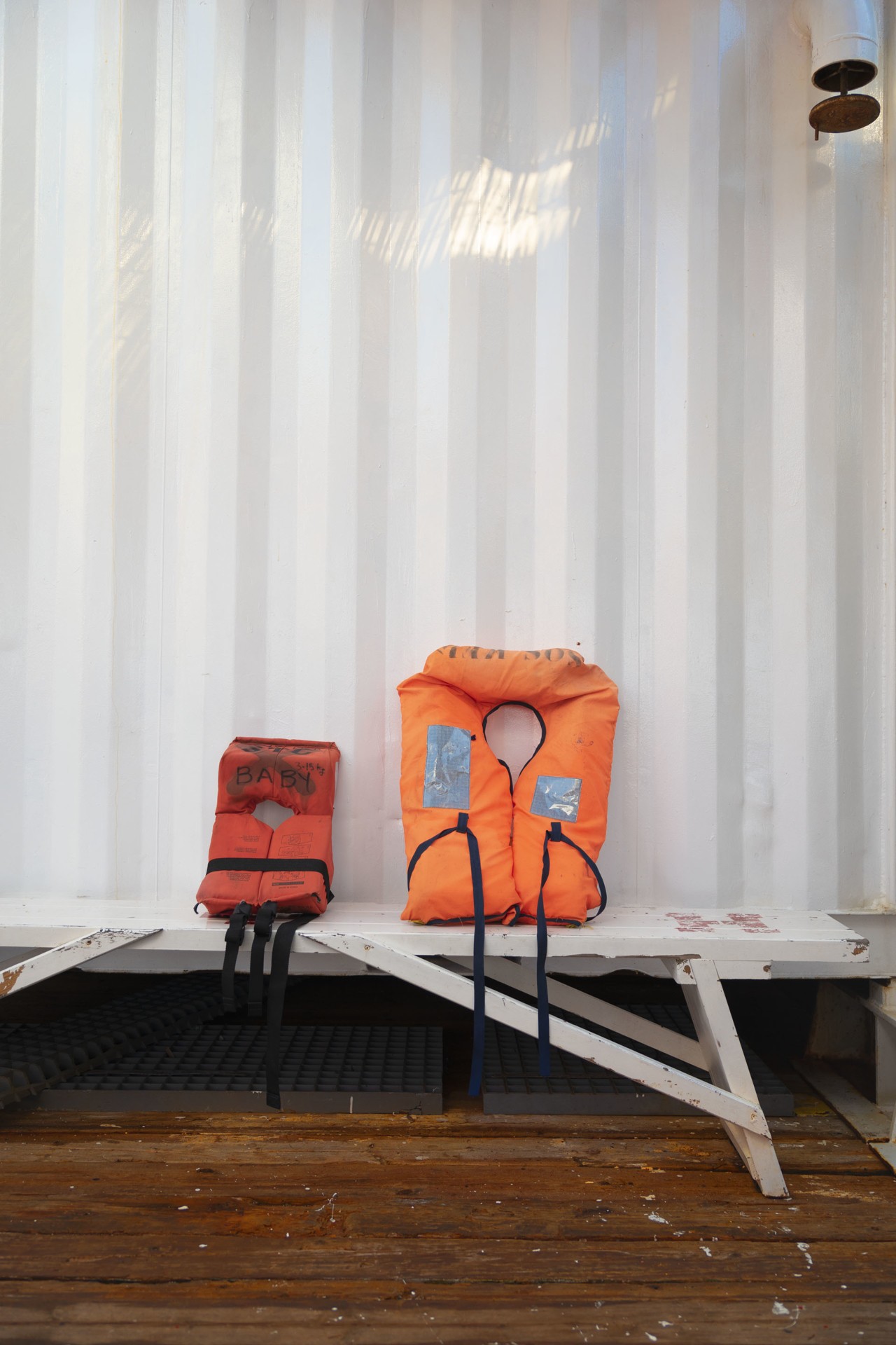 Life jackets Blue cargo shipment by Alessia Rollo