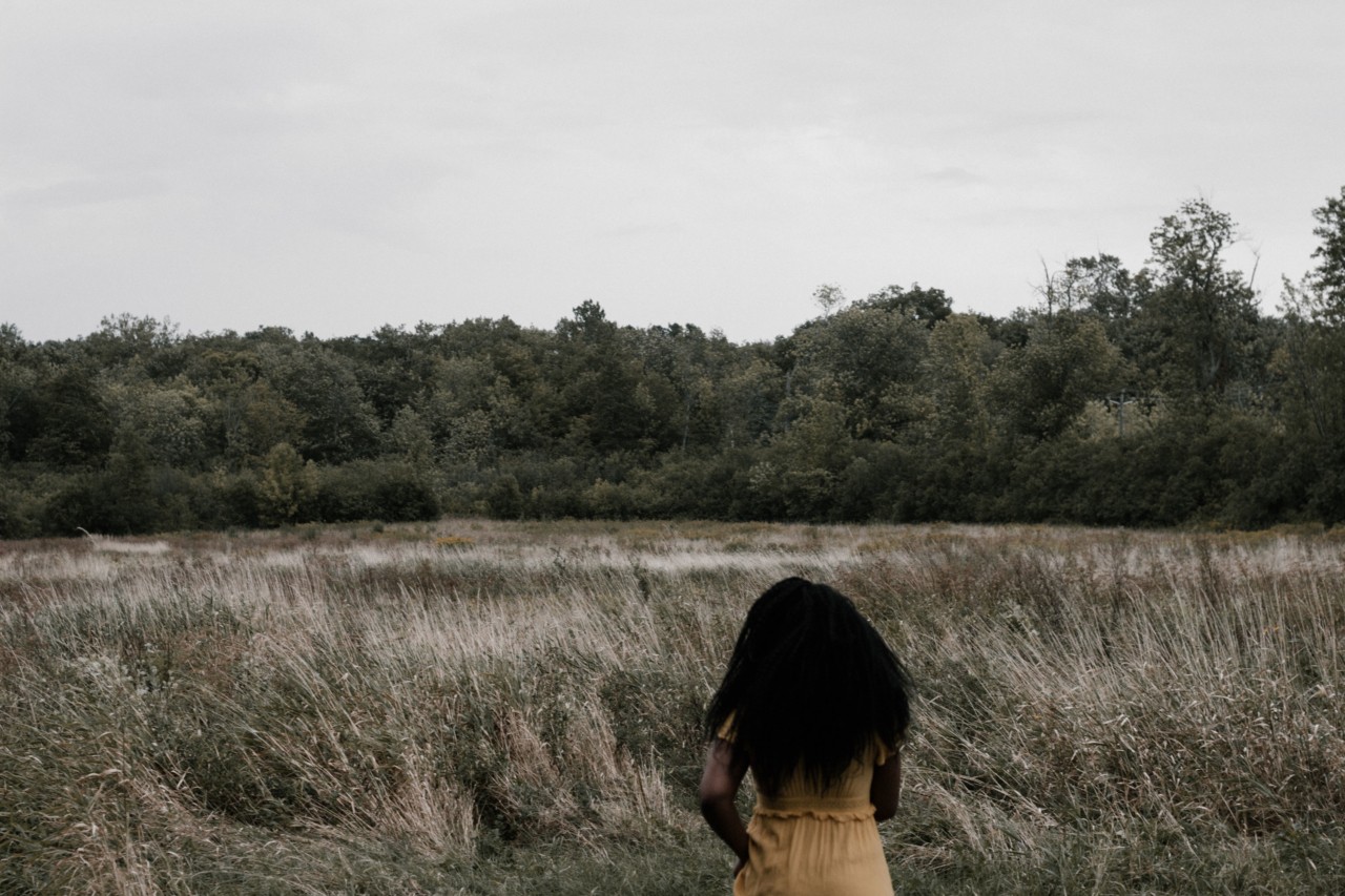 Woman foraging through nature by Gaëlle Elma