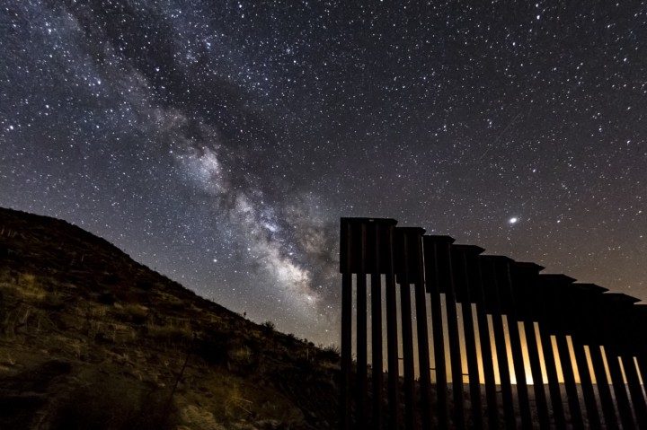 Border wall at night