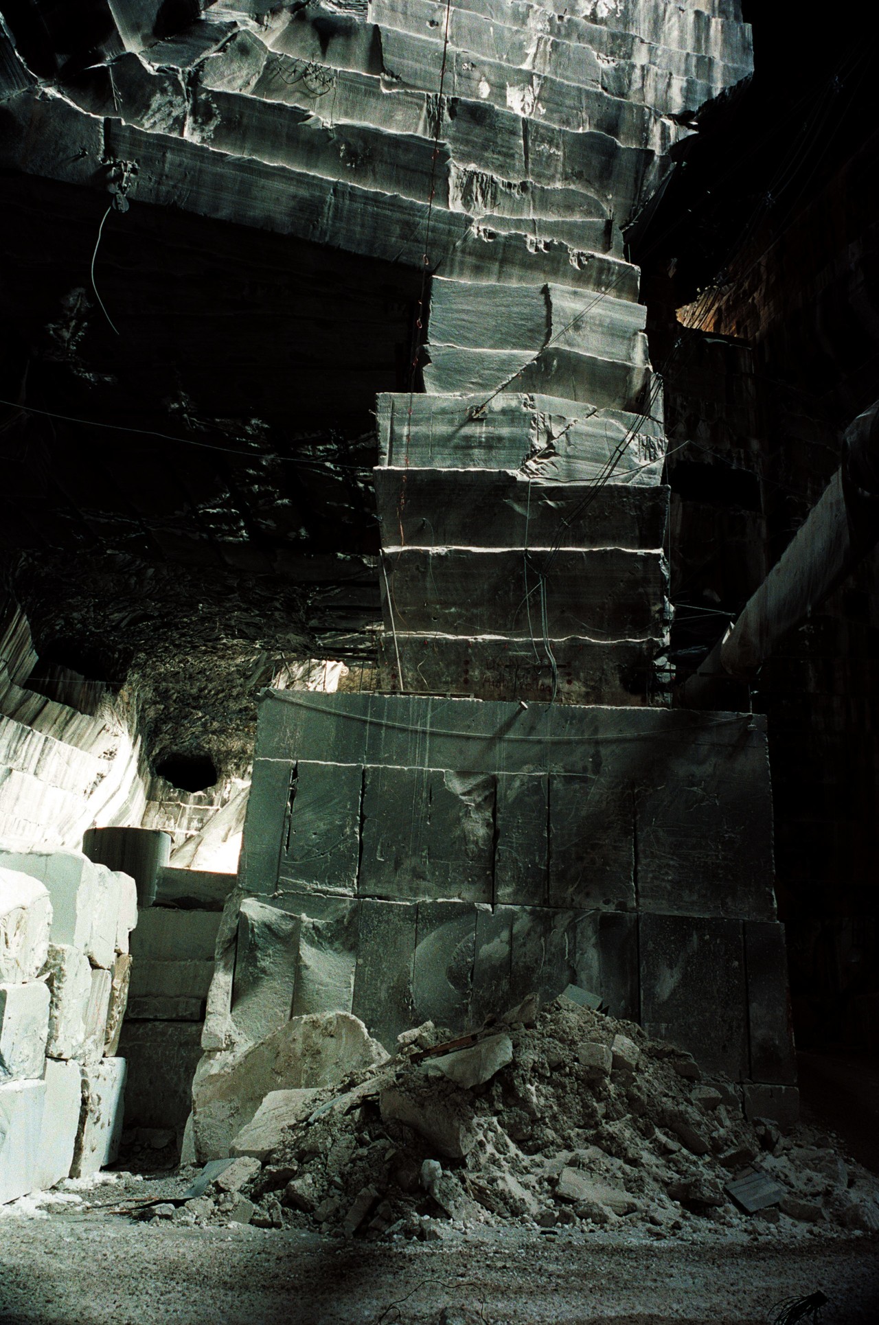 Marble rock quarry in abandoned American monument by Jeremy Everett