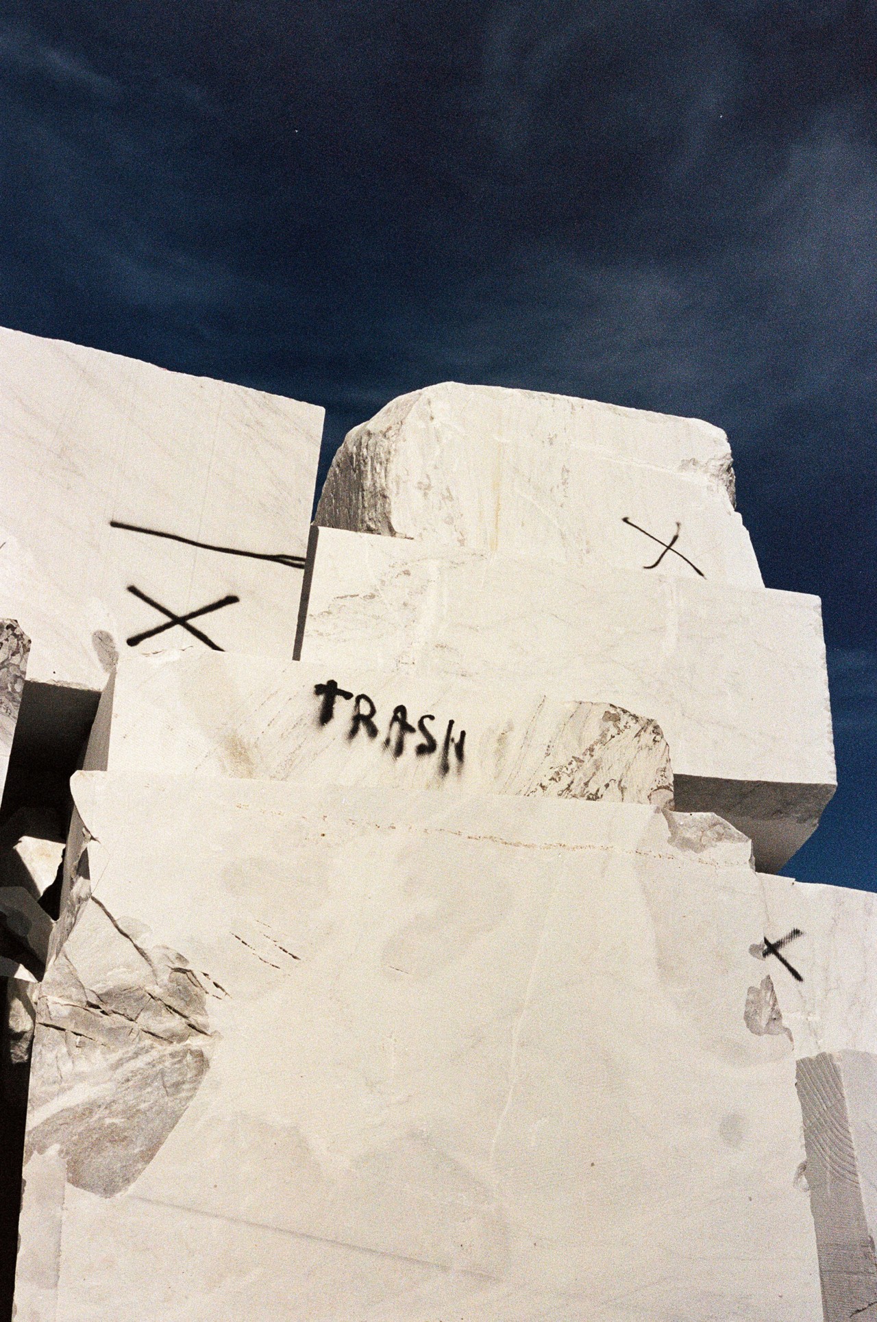 Marble rock quarry in abandoned American monument by Jeremy Everett