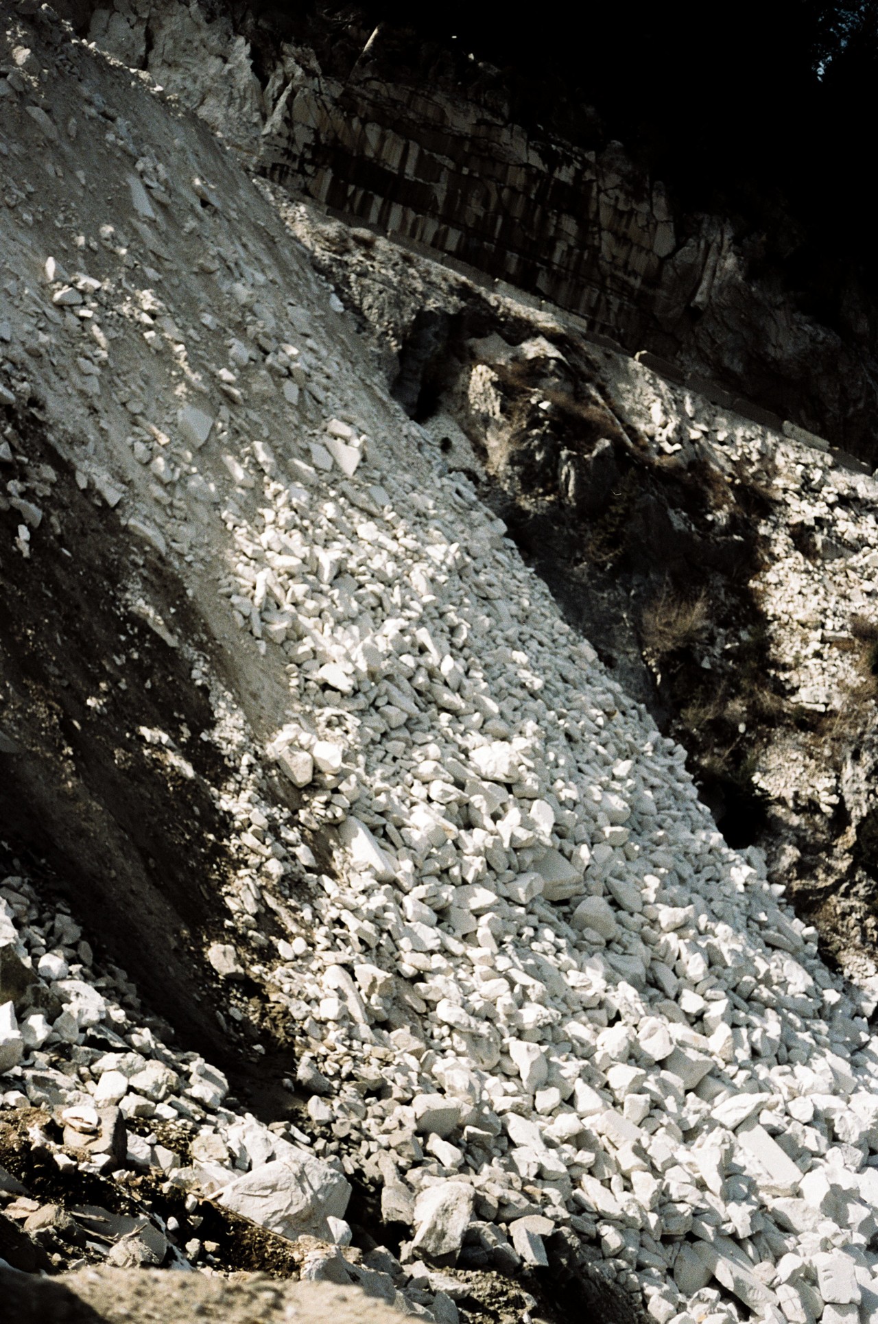 Marble rock quarry in abandoned American monument by Jeremy Everett