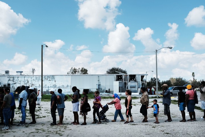 Rural migrant-workers in line for donations after Hurricane Irma by Spencer Platt
