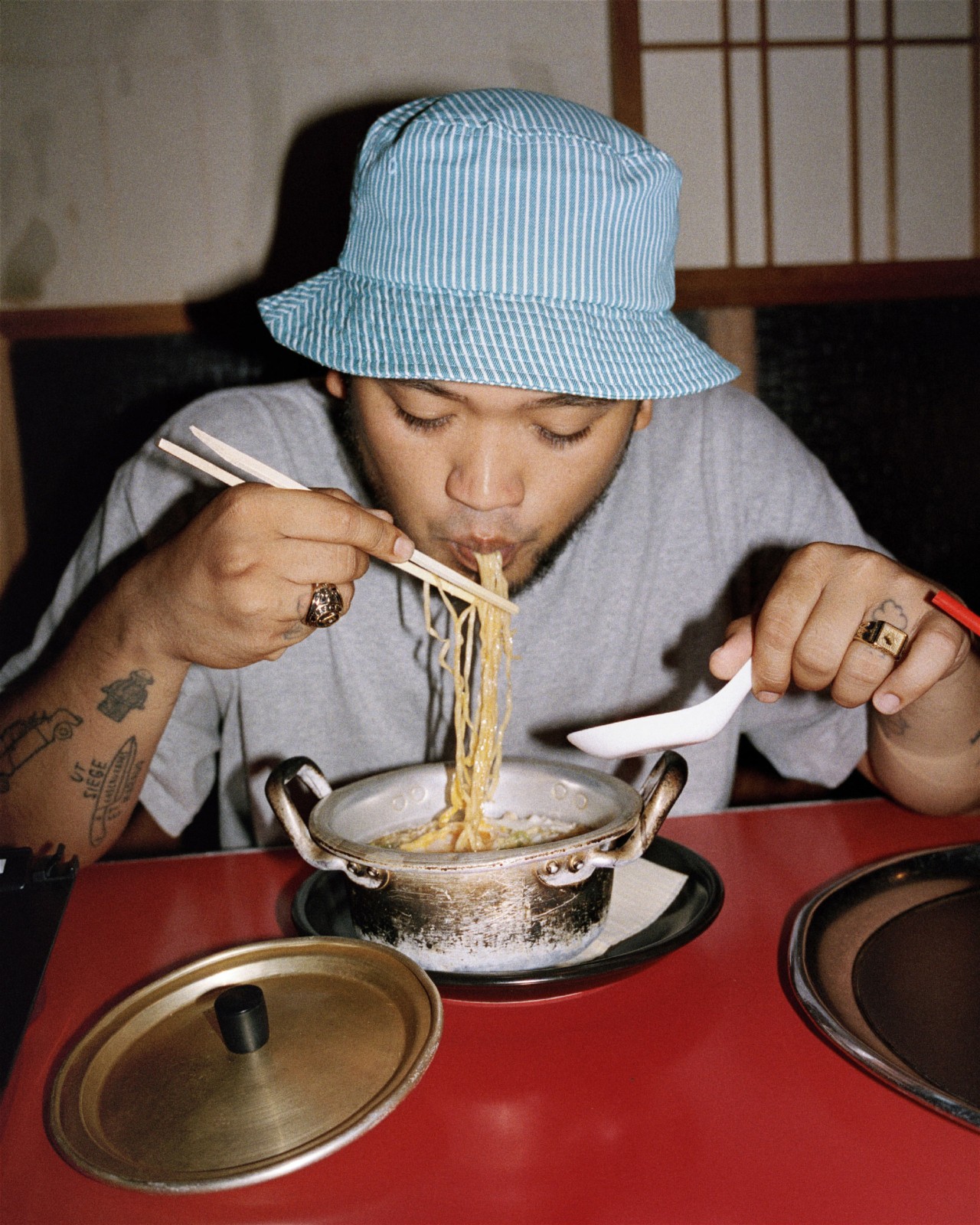 Person eating ramen