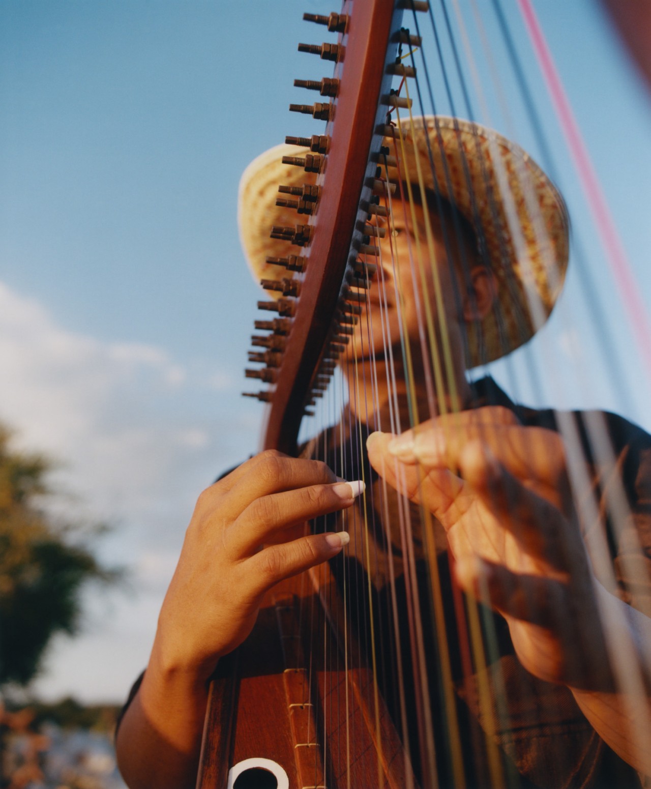 A Venezuelan man plays a string instrument