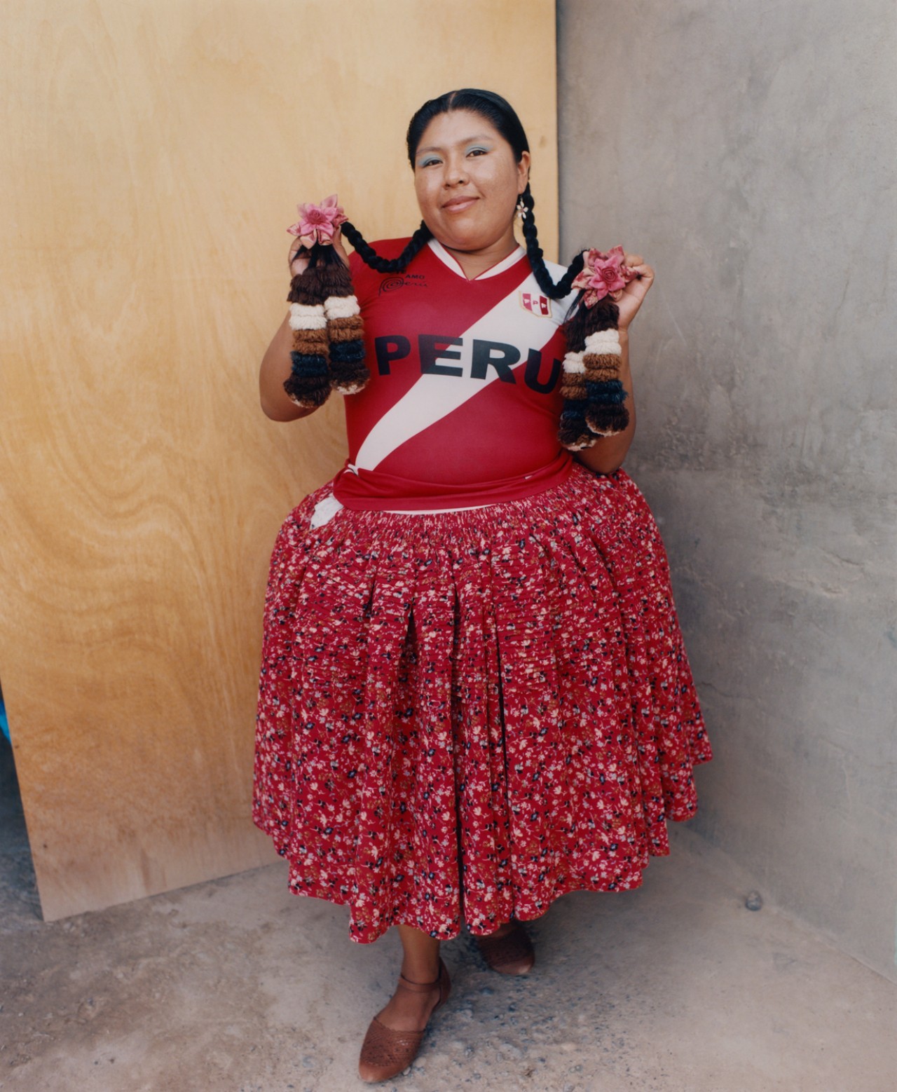Lourdes Gutiérrez wearing her vibrant red polleras.