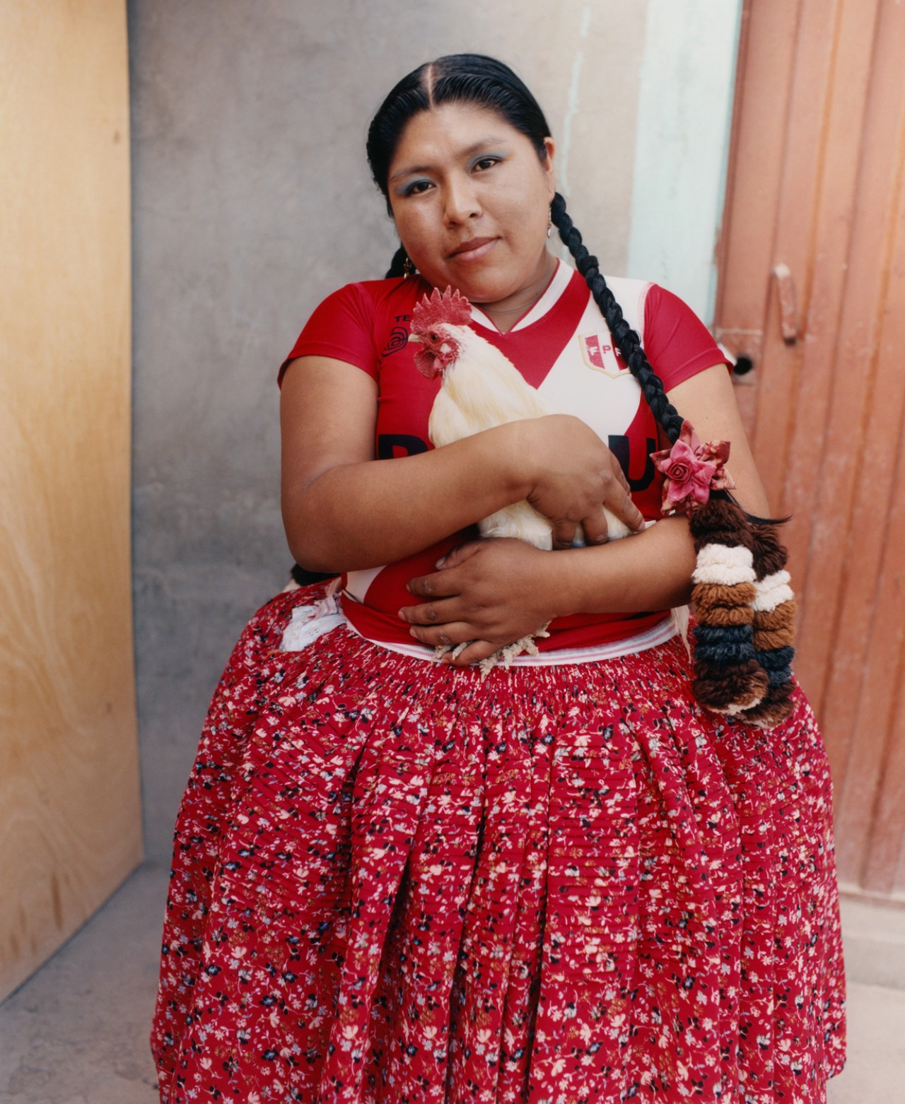 Lourdes Gutiérrez wearing her vibrant red polleras.