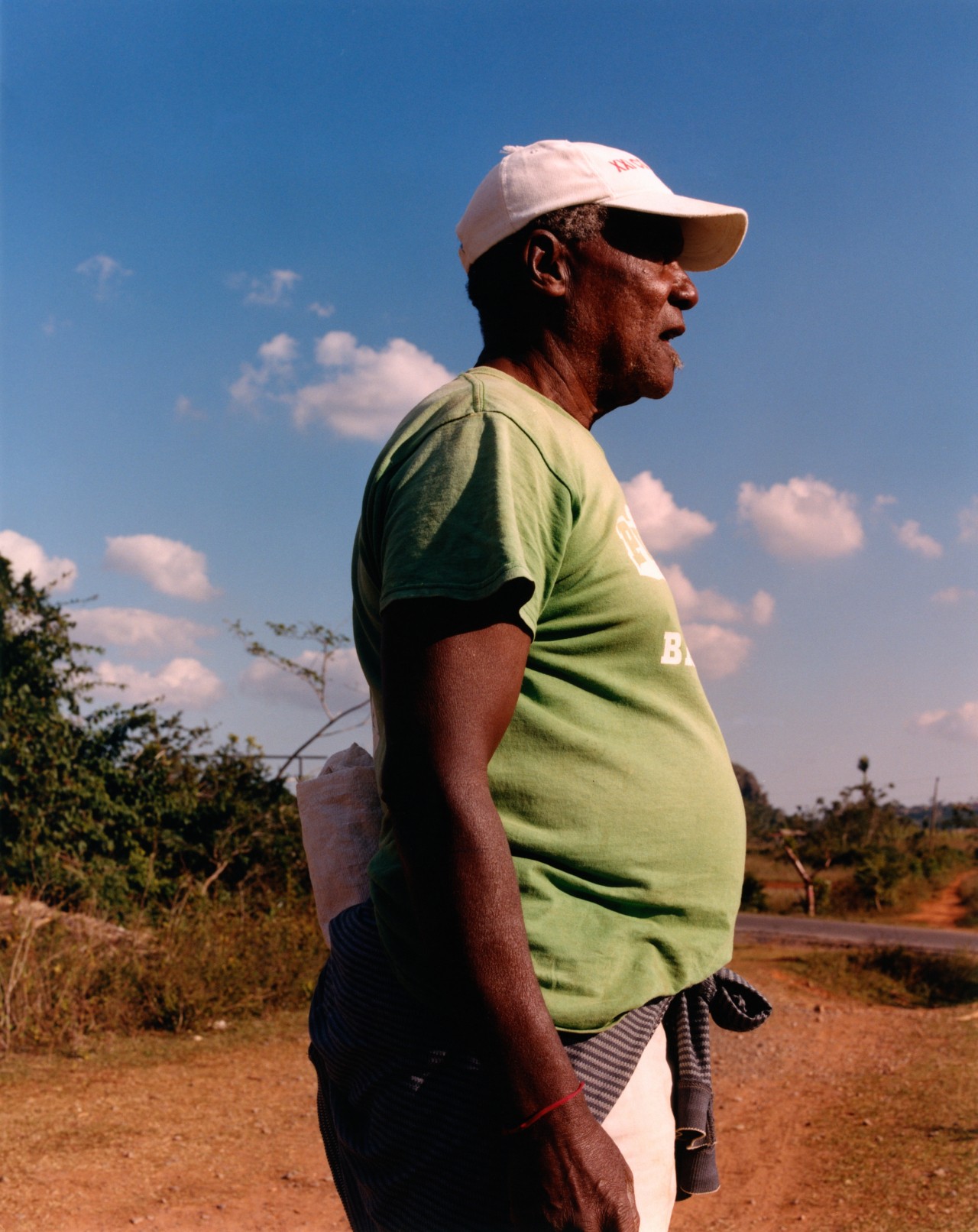 The profile of a man who is standing in the deserts of Cuba.