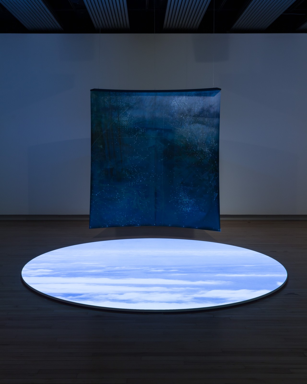 A blue square hovers above a white circle at the Hayward Gallery.