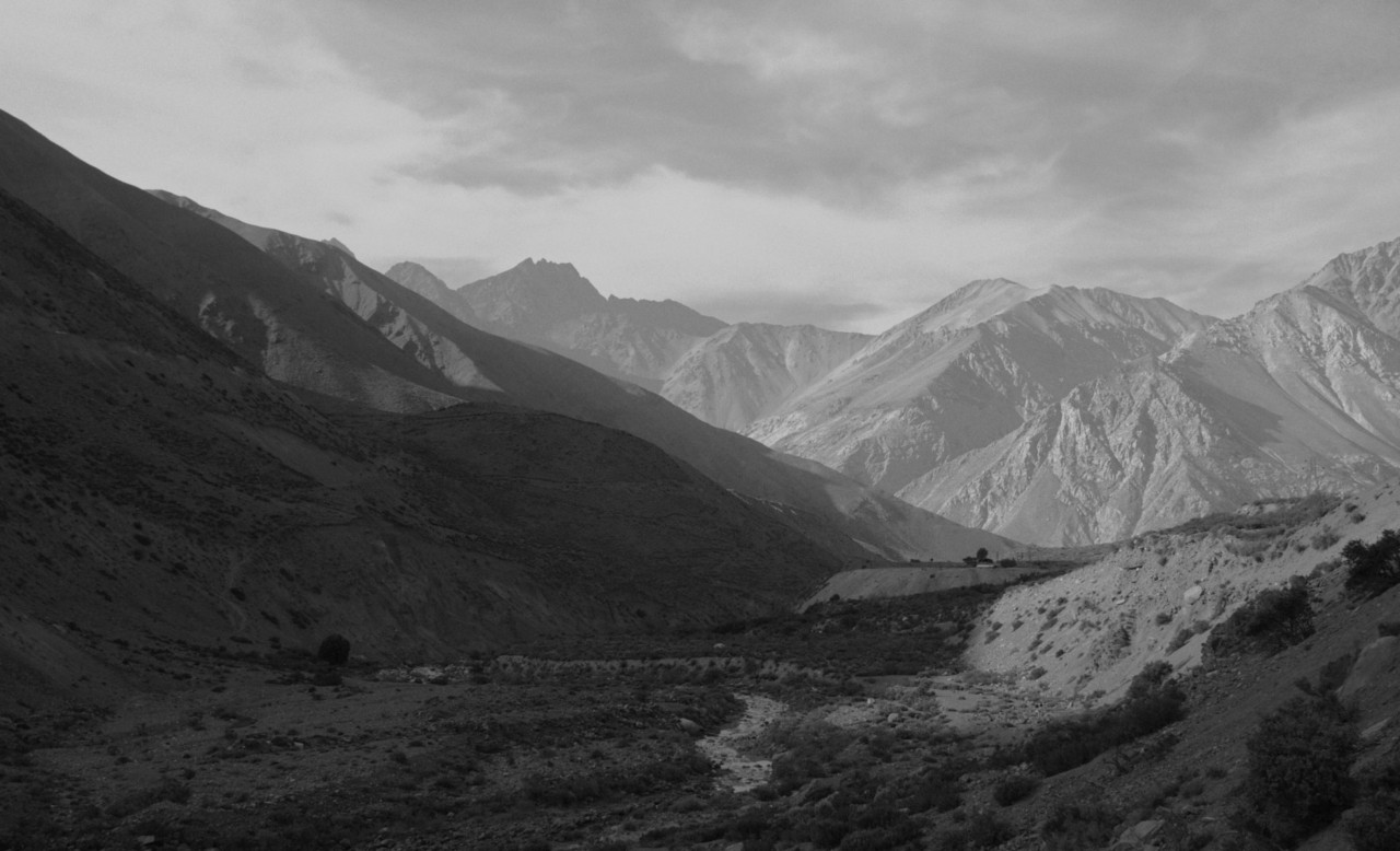 A vast, landscape shot of the Chilean mountain ranges.
