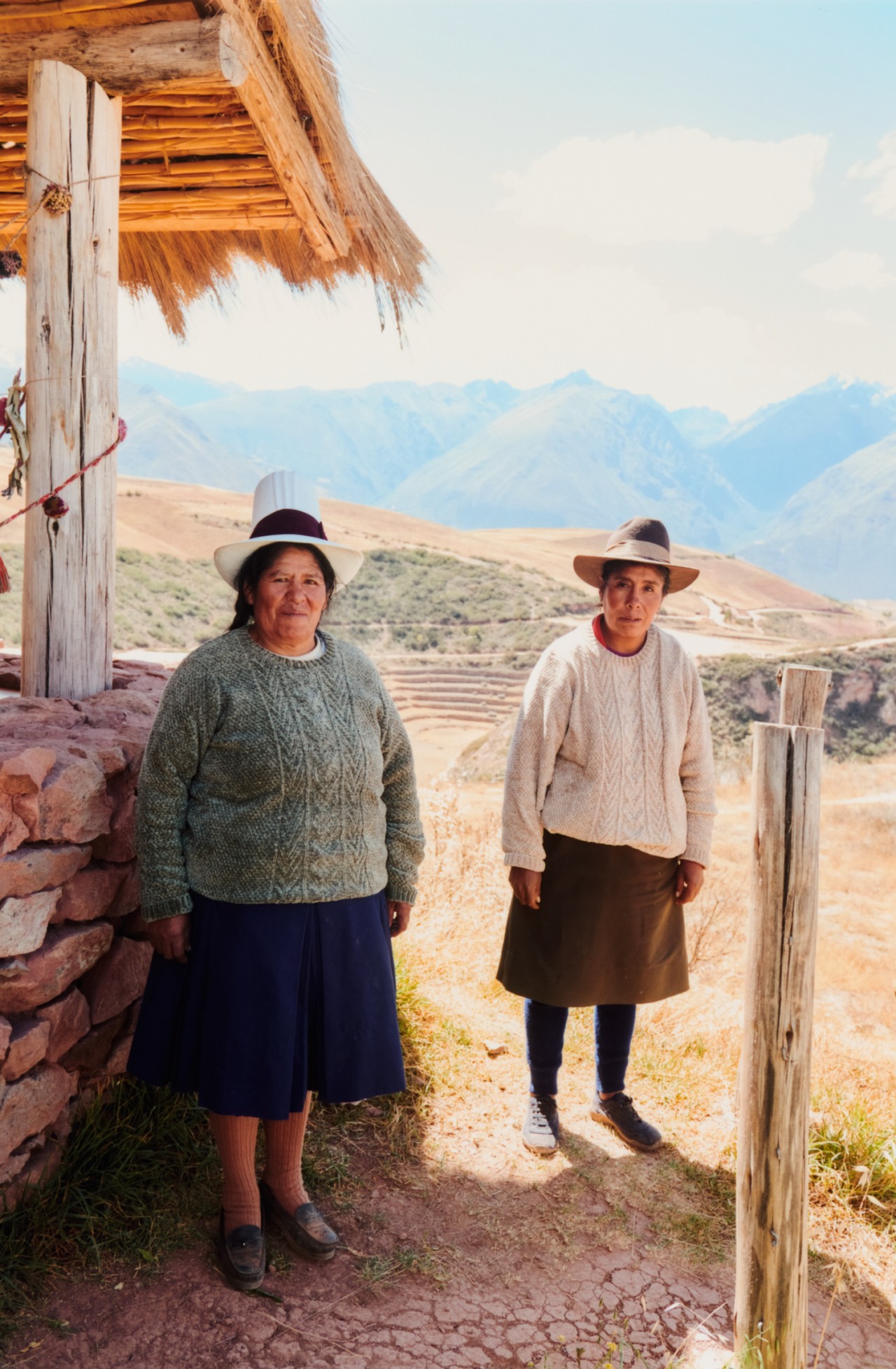 Purificacion and Yolanda standing outside in the Peruvian plains.