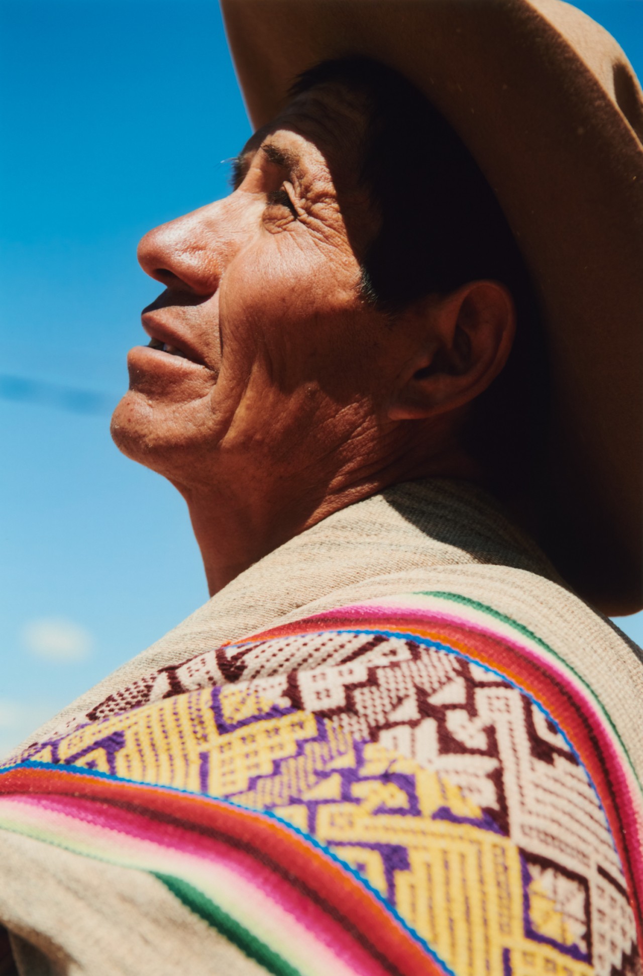Cleto Cusipaucar (guide at MIL) looks toward the sky.