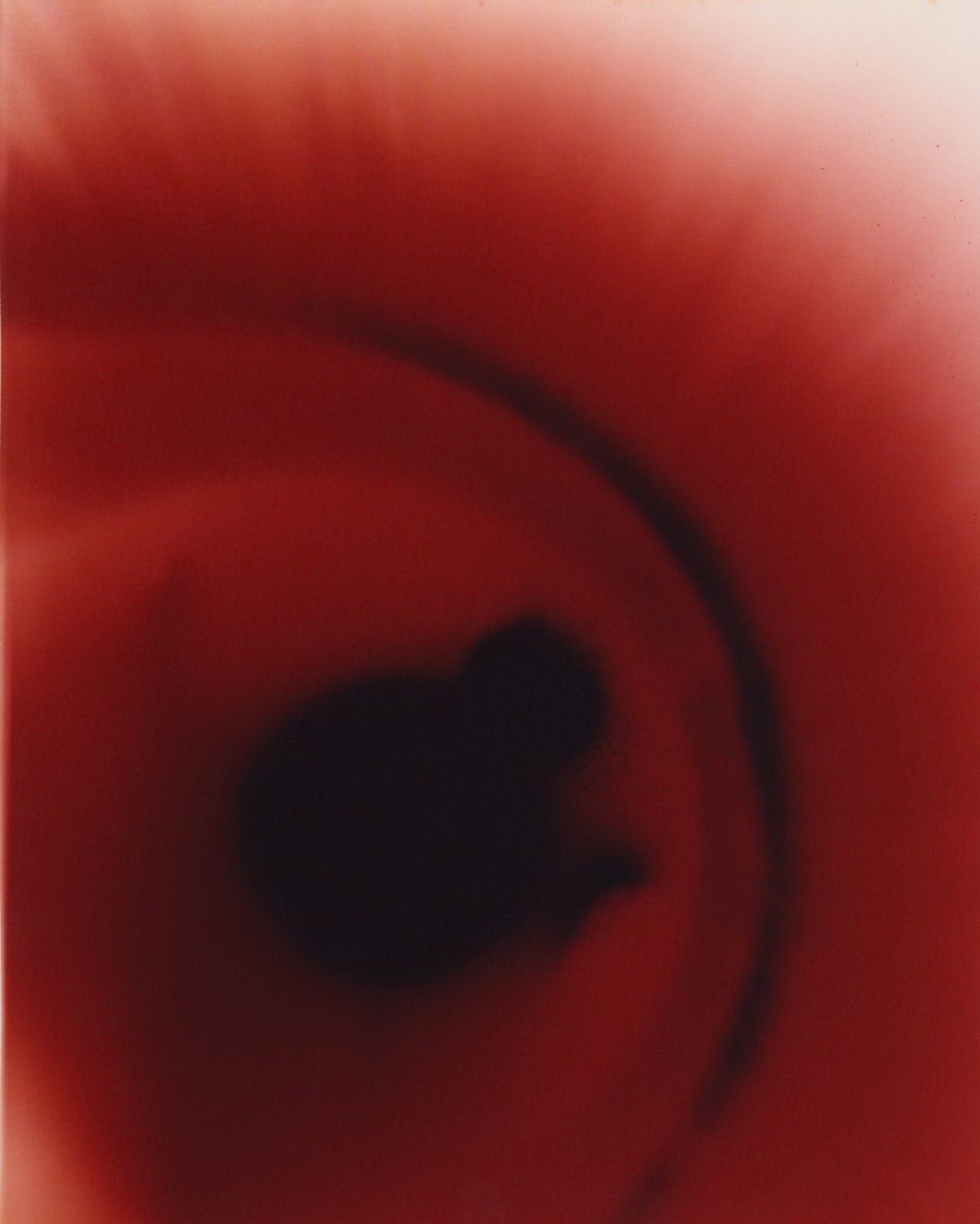 An abstract mix of alternating red and black colors.