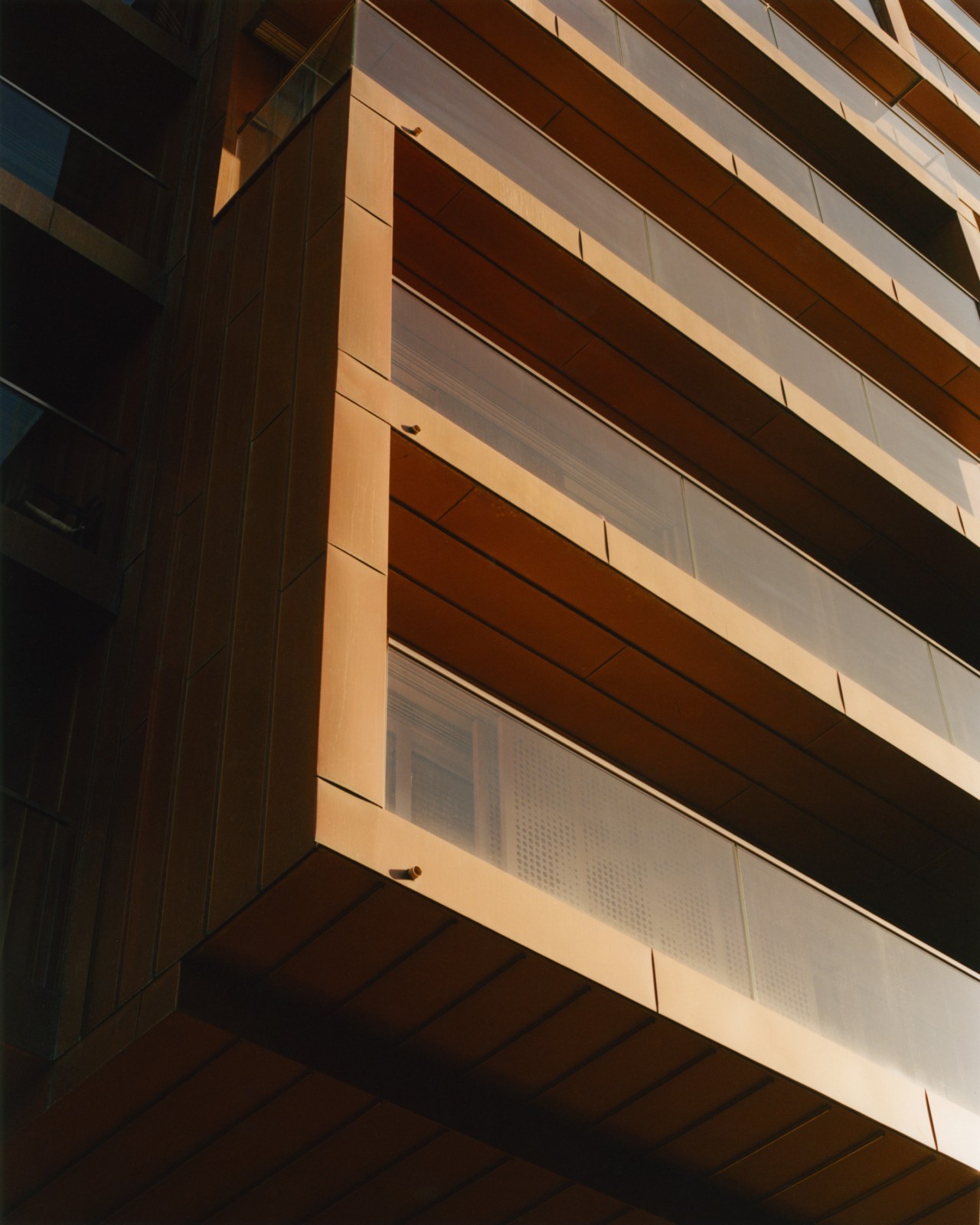 A close shot of the balconies of a building.