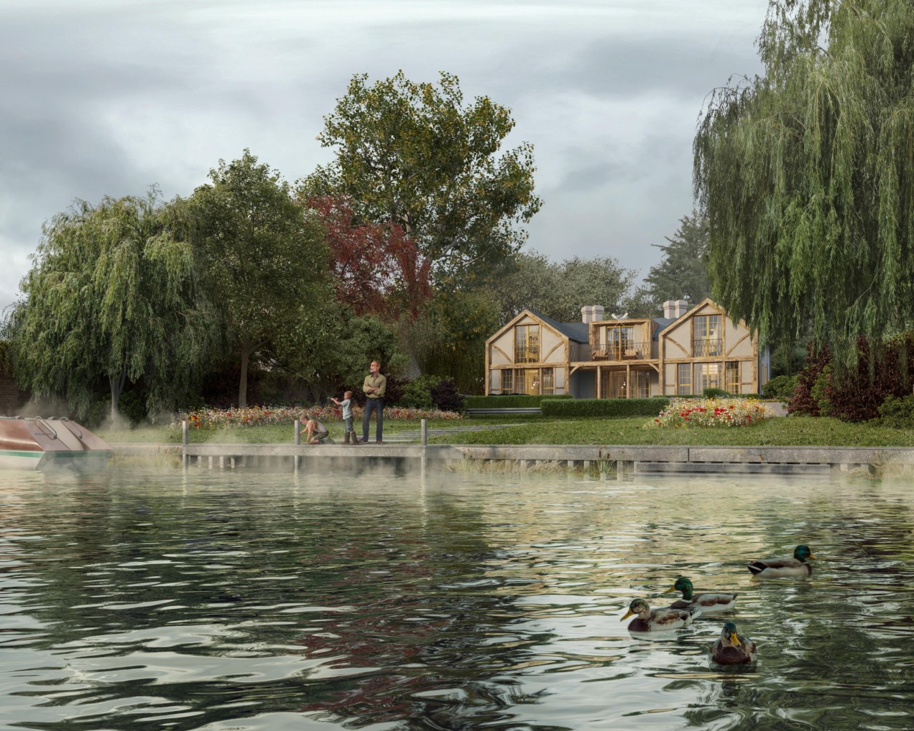 A family of three fishes at the edge of a lake with their amphibious house, that is surrounded by trees, behind them.