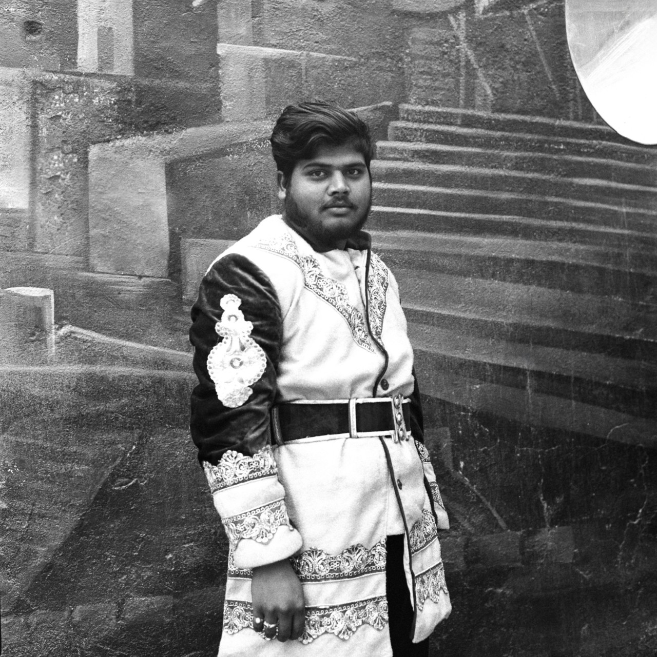A portrait of a local resident of Jhusi, Uttar Pradesh during his shift as a brass band member.