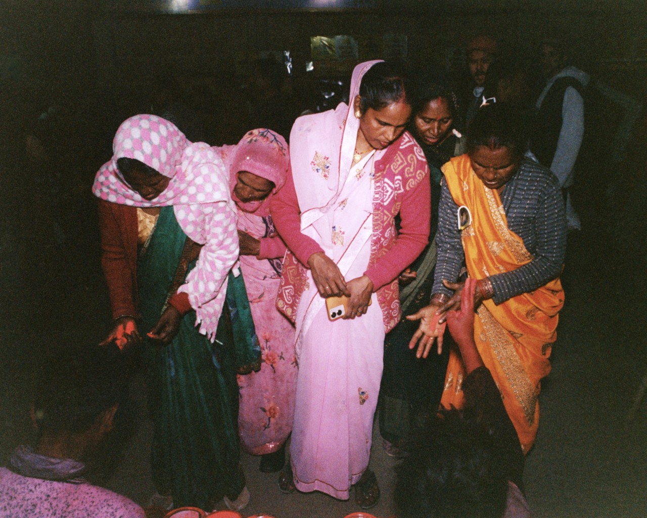 Women buy sindoor (a traditional vermillion cosmetic powder) in Kumbh.